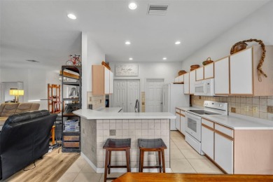 Presenting a well-maintained 2-bedroom, 2-bathroom home with an on Lake Ashton Golf Club in Florida - for sale on GolfHomes.com, golf home, golf lot
