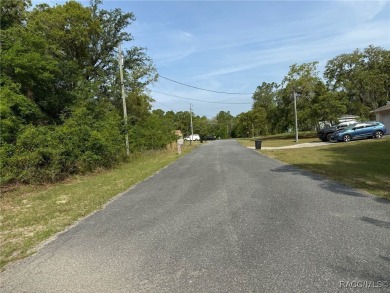 A quarter acre lot in Citrus Springs, paved road, power on on Citrus Springs Country Club in Florida - for sale on GolfHomes.com, golf home, golf lot