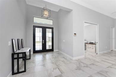 Luxurious Pebble Beach Model in Boca Royale Golf & Country Club
 on Boca Royale Golf and Country Club in Florida - for sale on GolfHomes.com, golf home, golf lot