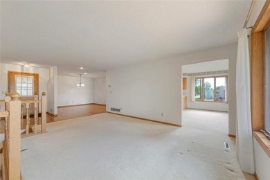 Picturesque views, wonderfully convenient, and plenty of space! on Brooktree Golf Course in Minnesota - for sale on GolfHomes.com, golf home, golf lot