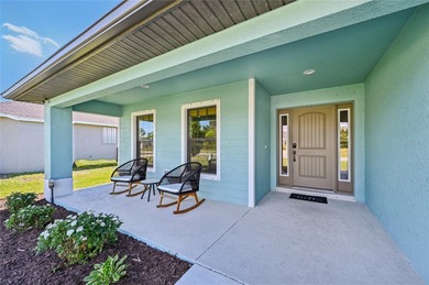 Built in 2022 and located in the desirable community of Rotonda on Rotonda Golf and Country Club The Palms Course in Florida - for sale on GolfHomes.com, golf home, golf lot