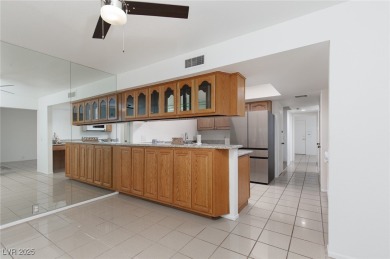 Charming residence nestled in the vibrant heart of Las Vegas on Las Vegas Country Club in Nevada - for sale on GolfHomes.com, golf home, golf lot