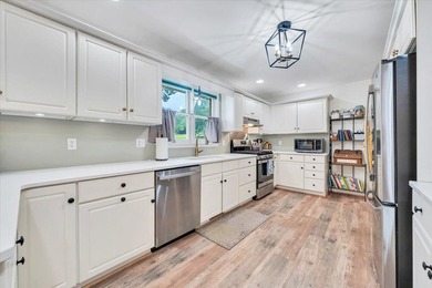 1037 Whitetail Dr is a beautifully maintained all-brick modern on Mariners Landing Golf and Country Club in Virginia - for sale on GolfHomes.com, golf home, golf lot