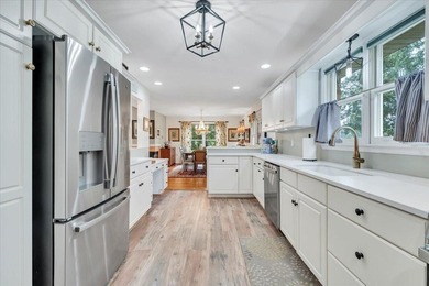 1037 Whitetail Dr is a beautifully maintained all-brick modern on Mariners Landing Golf and Country Club in Virginia - for sale on GolfHomes.com, golf home, golf lot