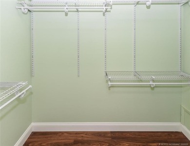 Lovely CBS 3 bedroom, 2 bath, 2 car garage split plan home with on Martin Downs Country Club in Florida - for sale on GolfHomes.com, golf home, golf lot