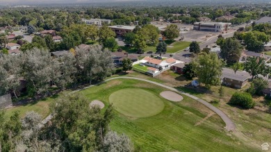 Nestled in the heart of Murray, this beautifully renovated home on Mick Riley Golf Course in Utah - for sale on GolfHomes.com, golf home, golf lot