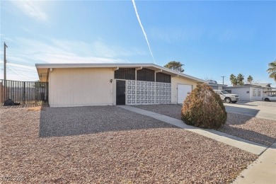 No HOA, on a golf course, and RV Parking! This well maintained on Desert Rose Golf Course in Nevada - for sale on GolfHomes.com, golf home, golf lot