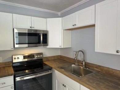 Renovated Waterfront Villa! Freshly painted, vinyl wood flooring on Kings Point Golf -Flanders Way in Florida - for sale on GolfHomes.com, golf home, golf lot