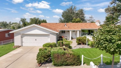 Nestled in the heart of Murray, this beautifully renovated home on Mick Riley Golf Course in Utah - for sale on GolfHomes.com, golf home, golf lot