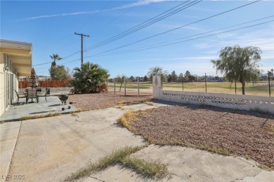 No HOA, on a golf course, and RV Parking! This well maintained on Desert Rose Golf Course in Nevada - for sale on GolfHomes.com, golf home, golf lot