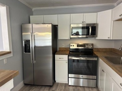 Renovated Waterfront Villa! Freshly painted, vinyl wood flooring on Kings Point Golf -Flanders Way in Florida - for sale on GolfHomes.com, golf home, golf lot