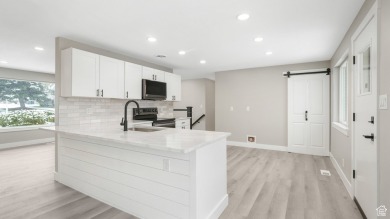 Nestled in the heart of Murray, this beautifully renovated home on Mick Riley Golf Course in Utah - for sale on GolfHomes.com, golf home, golf lot