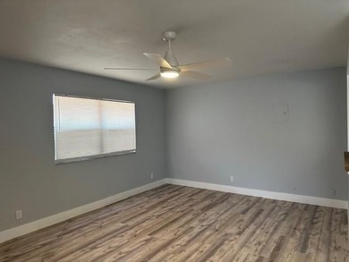 Renovated Waterfront Villa! Freshly painted, vinyl wood flooring on Kings Point Golf -Flanders Way in Florida - for sale on GolfHomes.com, golf home, golf lot