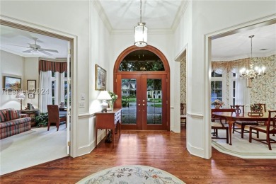 Enjoy the peaceful enlarged screen porch of this classic Belfair on Belfair Golf Club in South Carolina - for sale on GolfHomes.com, golf home, golf lot