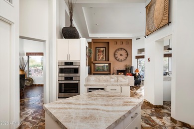 Located within the prestigious gated community of The Monument on Troon North Golf Club  in Arizona - for sale on GolfHomes.com, golf home, golf lot