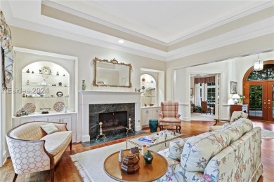 Enjoy the peaceful enlarged screen porch of this classic Belfair on Belfair Golf Club in South Carolina - for sale on GolfHomes.com, golf home, golf lot