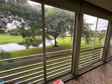 REDUCED to Assist with Improvements. SPECTACULAR EXPANSIVE on Wynmoor Golf Course in Florida - for sale on GolfHomes.com, golf home, golf lot