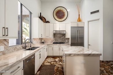 Located within the prestigious gated community of The Monument on Troon North Golf Club  in Arizona - for sale on GolfHomes.com, golf home, golf lot