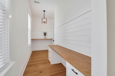 Enjoy coastal living in this better-than-new home on a private on Charleston National Golf Club in South Carolina - for sale on GolfHomes.com, golf home, golf lot