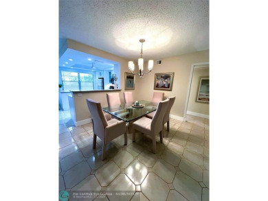 REDUCED to Assist with Improvements. SPECTACULAR EXPANSIVE on Wynmoor Golf Course in Florida - for sale on GolfHomes.com, golf home, golf lot