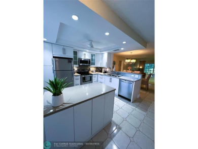REDUCED to Assist with Improvements. SPECTACULAR EXPANSIVE on Wynmoor Golf Course in Florida - for sale on GolfHomes.com, golf home, golf lot