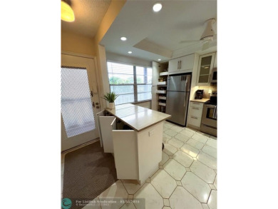REDUCED to Assist with Improvements. SPECTACULAR EXPANSIVE on Wynmoor Golf Course in Florida - for sale on GolfHomes.com, golf home, golf lot