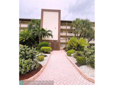 REDUCED to Assist with Improvements. SPECTACULAR EXPANSIVE on Wynmoor Golf Course in Florida - for sale on GolfHomes.com, golf home, golf lot