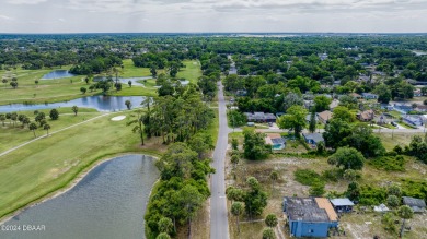 Looking for a cozy home with a convenient location near on Daytona Beach Golf Club in Florida - for sale on GolfHomes.com, golf home, golf lot