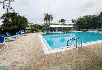 REDUCED to Assist with Improvements. SPECTACULAR EXPANSIVE on Wynmoor Golf Course in Florida - for sale on GolfHomes.com, golf home, golf lot
