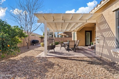 This meticulously maintained home offers effortless living with on Seville Golf and Country Club in Arizona - for sale on GolfHomes.com, golf home, golf lot