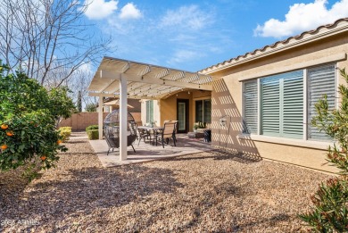 This meticulously maintained home offers effortless living with on Seville Golf and Country Club in Arizona - for sale on GolfHomes.com, golf home, golf lot