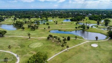 Looking for a cozy home with a convenient location near on Daytona Beach Golf Club in Florida - for sale on GolfHomes.com, golf home, golf lot