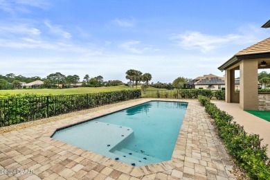 Gorgeous grand entrance through your foyer to the Great Room on Plantation Bay Golf and Country Club in Florida - for sale on GolfHomes.com, golf home, golf lot