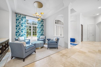 This custom-built home sits on more than two-thirds of an acre on Old Marsh Golf Club in Florida - for sale on GolfHomes.com, golf home, golf lot