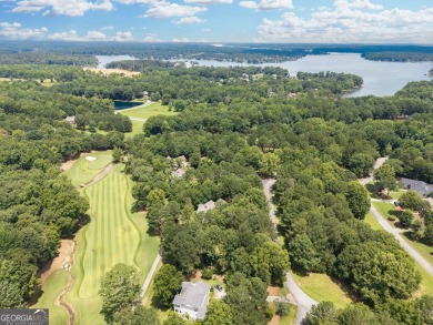 Don't miss this rare opportunity to own a premium lot located on on Great Waters Course At Reynolds Plantation in Georgia - for sale on GolfHomes.com, golf home, golf lot