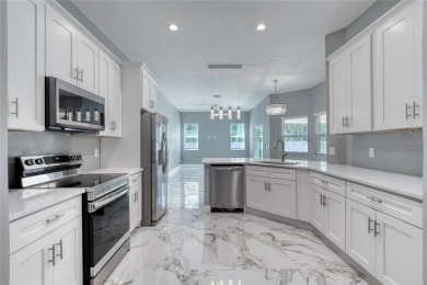 This newly remodeled 3-bedroom, 3-bathroom home in the desirable on The Grand Club - Pine Lakes Course in Florida - for sale on GolfHomes.com, golf home, golf lot