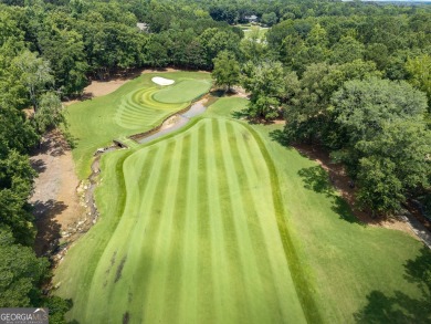 Don't miss this rare opportunity to own a premium lot located on on Great Waters Course At Reynolds Plantation in Georgia - for sale on GolfHomes.com, golf home, golf lot