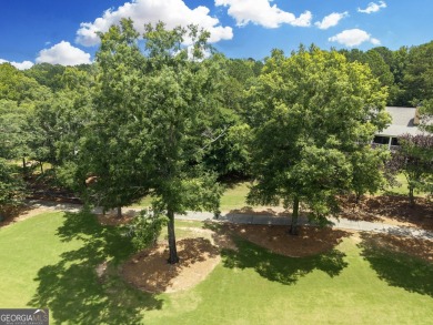 Don't miss this rare opportunity to own a premium lot located on on Great Waters Course At Reynolds Plantation in Georgia - for sale on GolfHomes.com, golf home, golf lot