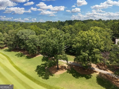 Don't miss this rare opportunity to own a premium lot located on on Great Waters Course At Reynolds Plantation in Georgia - for sale on GolfHomes.com, golf home, golf lot