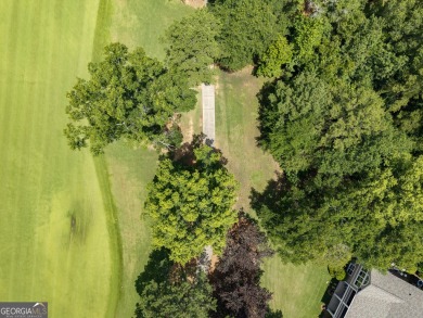 Don't miss this rare opportunity to own a premium lot located on on Great Waters Course At Reynolds Plantation in Georgia - for sale on GolfHomes.com, golf home, golf lot