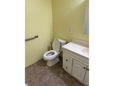 Don't miss this spacious 2,520 sq ft home located on 2.89 acres on The Pines Golf Course at Lake Isabella in Michigan - for sale on GolfHomes.com, golf home, golf lot