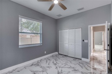This newly remodeled 3-bedroom, 3-bathroom home in the desirable on The Grand Club - Pine Lakes Course in Florida - for sale on GolfHomes.com, golf home, golf lot