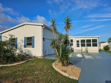 This garage is 32 feet by 22 feet, 2 separate doors, a 12-foot on Southport Springs Golf Club in Florida - for sale on GolfHomes.com, golf home, golf lot