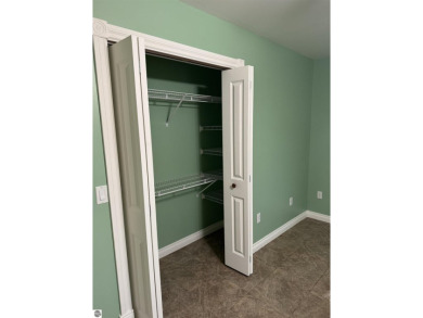 Don't miss this spacious 2,520 sq ft home located on 2.89 acres on The Pines Golf Course at Lake Isabella in Michigan - for sale on GolfHomes.com, golf home, golf lot