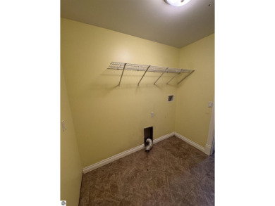 Don't miss this spacious 2,520 sq ft home located on 2.89 acres on The Pines Golf Course at Lake Isabella in Michigan - for sale on GolfHomes.com, golf home, golf lot