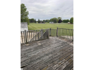 Don't miss this spacious 2,520 sq ft home located on 2.89 acres on The Pines Golf Course at Lake Isabella in Michigan - for sale on GolfHomes.com, golf home, golf lot