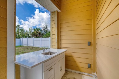 This newly remodeled 3-bedroom, 3-bathroom home in the desirable on The Grand Club - Pine Lakes Course in Florida - for sale on GolfHomes.com, golf home, golf lot