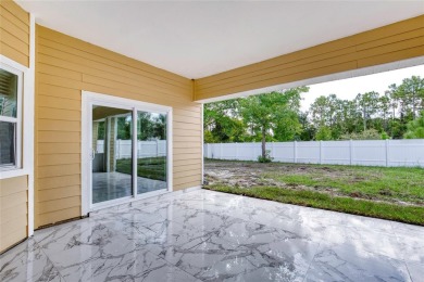 This newly remodeled 3-bedroom, 3-bathroom home in the desirable on The Grand Club - Pine Lakes Course in Florida - for sale on GolfHomes.com, golf home, golf lot