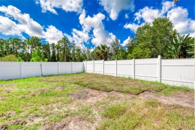 This newly remodeled 3-bedroom, 3-bathroom home in the desirable on The Grand Club - Pine Lakes Course in Florida - for sale on GolfHomes.com, golf home, golf lot