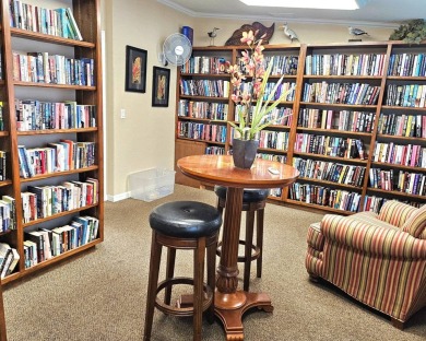 This garage is 32 feet by 22 feet, 2 separate doors, a 12-foot on Southport Springs Golf Club in Florida - for sale on GolfHomes.com, golf home, golf lot